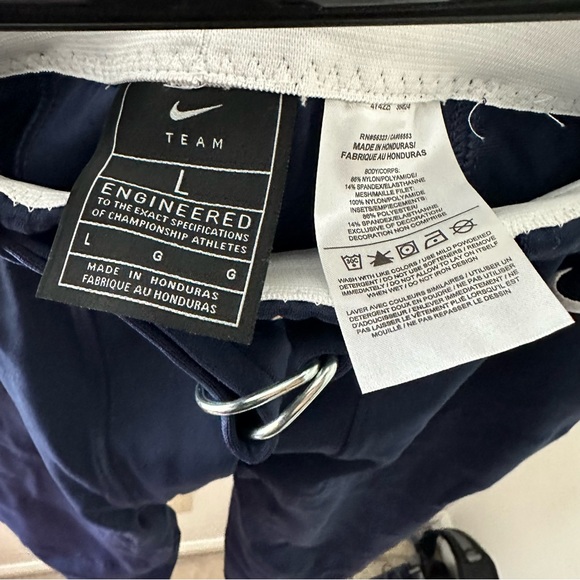 New Nike Engineered Men's Padded Football Pants Navy Blue  w/ White Stripe L - Picture 3 of 4